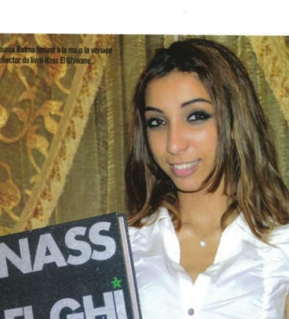 Dounia Batma holding the Nass El Ghiwane book