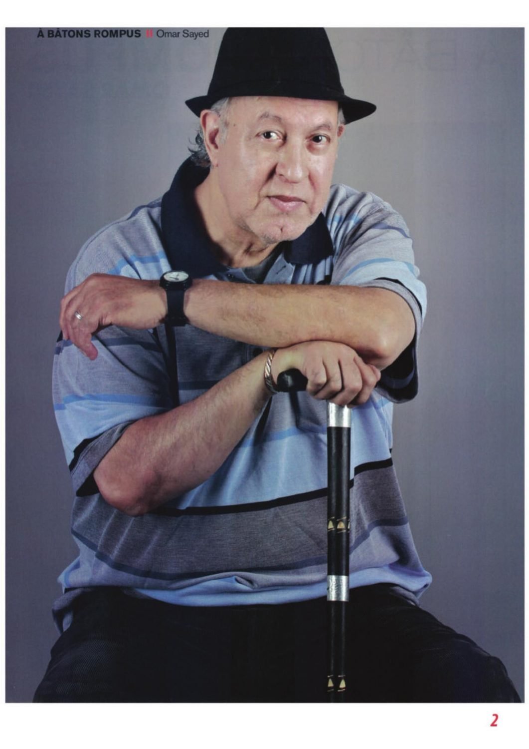 Omar Sayed studio portrait with cane
