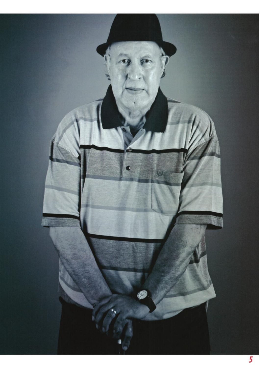 Omar Sayed, standing studio portrait